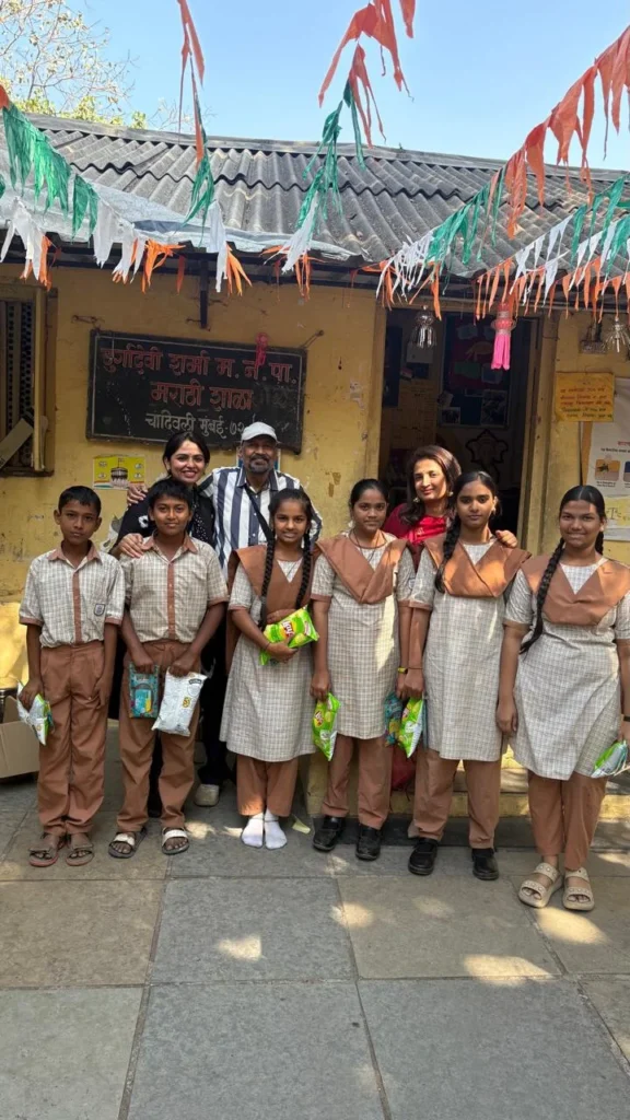 B-Sociall team with school students