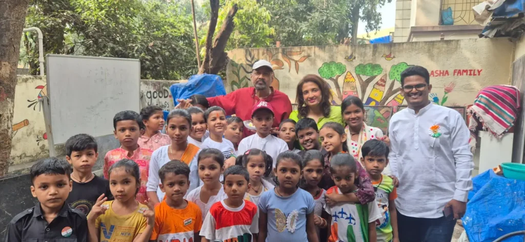 B-Sociall team with children of the Asha Family